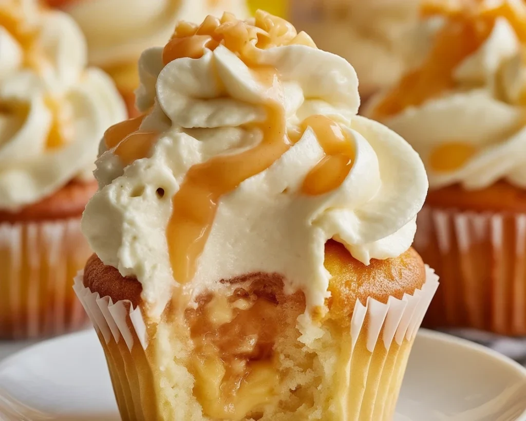 Irresistible Honey Peach Cream Cheese Cupcakes to Savor 5 Delicious Honey Peach Cream Cheese Cupcakes with fresh peaches and honey drizzle.