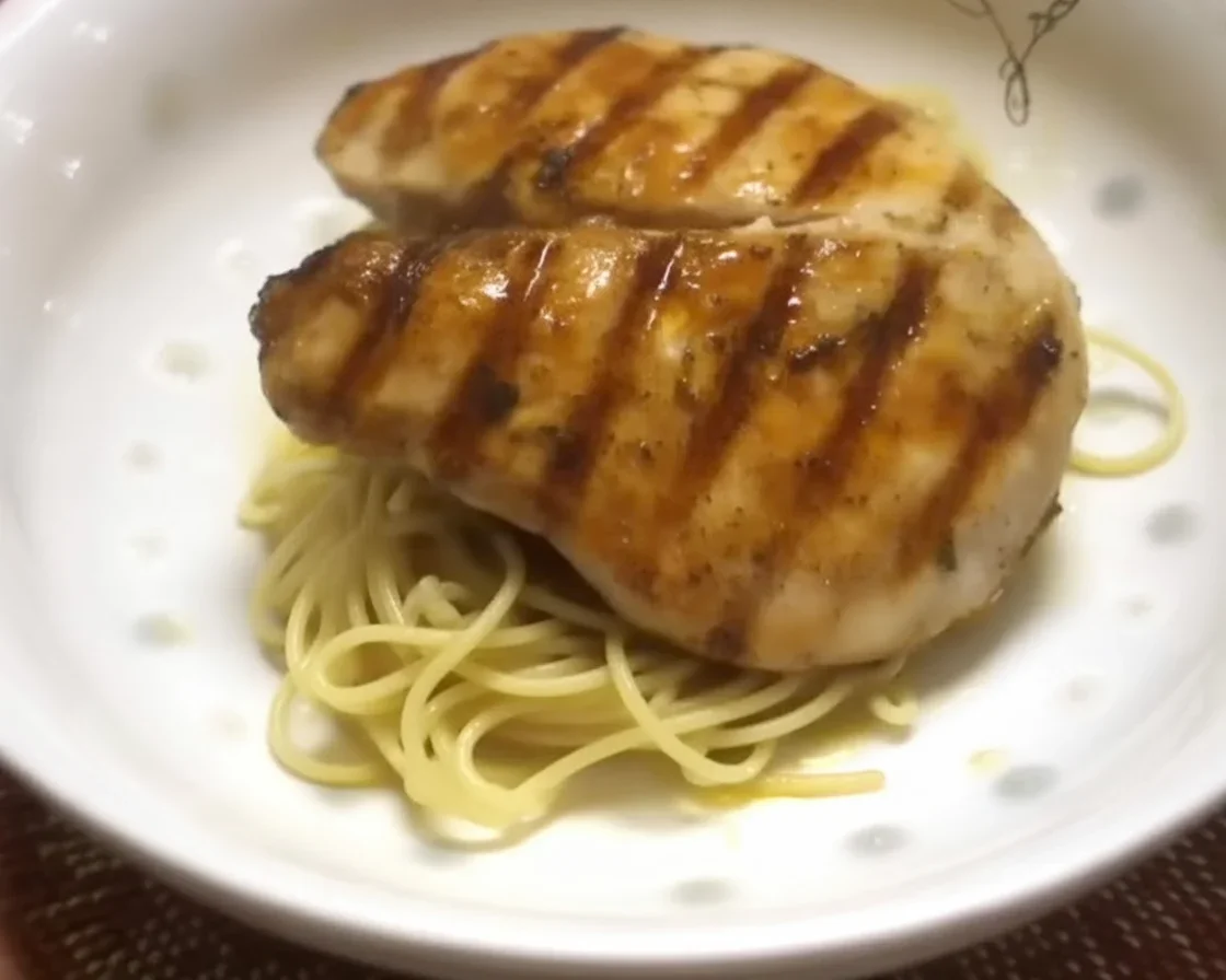 Wahoo Wonders: Simple and Delicious Recipes You’ll Love 1 Seared wahoo fillets garnished with mango salsa and fresh herbs on a plate.